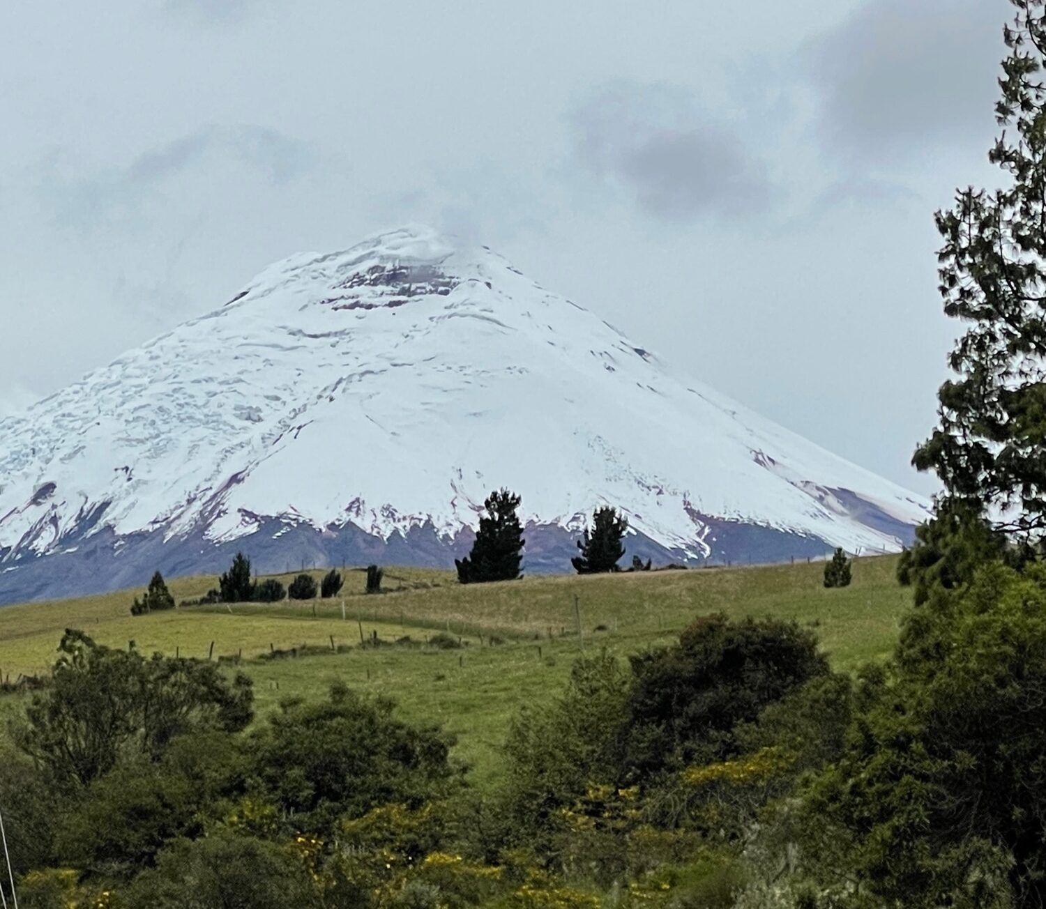 Snow-capped volcano above the Ecuadorian Andes